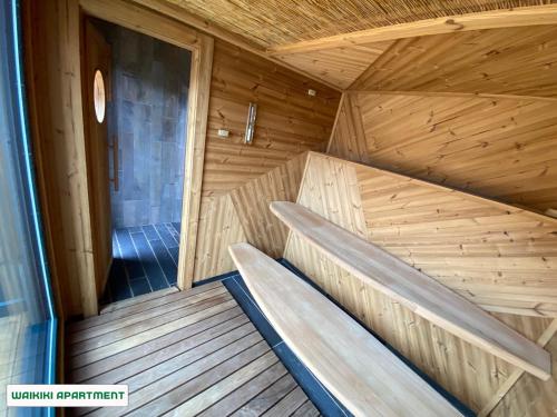 a inside of a sauna with two benches at You and Me Apartments in Prosenická Lhota