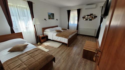 Posteľ alebo postele v izbe v ubytovaní B&B Plitvice Lakes Villa Mija
