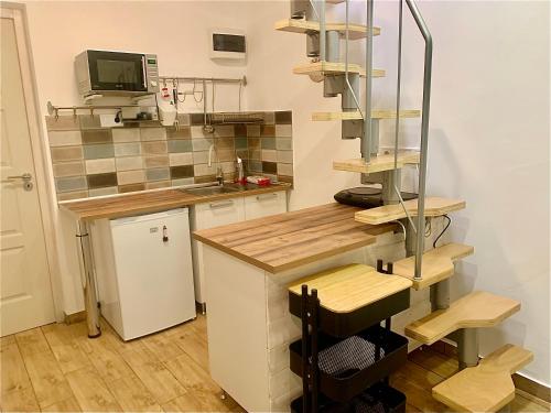 Dapur atau dapur kecil di Öböl Apartman
