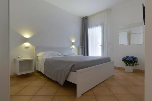 Postel nebo postele na pokoji v ubytování Casa Cardignan