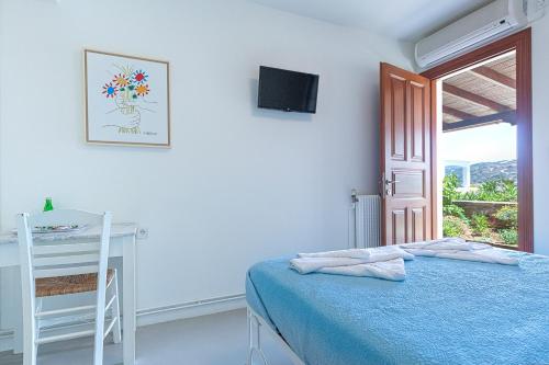 Postel nebo postele na pokoji v ubytování Anemoesa