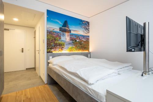 Säng eller sängar i ett rum på Arbio I Urbanstay Serviced Studios & Apartments