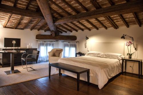 Katil atau katil-katil dalam bilik di Relais Villa Ormaneto