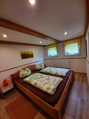 Ein Bett oder Betten in einem Zimmer der Unterkunft Ferienhaus Schoene