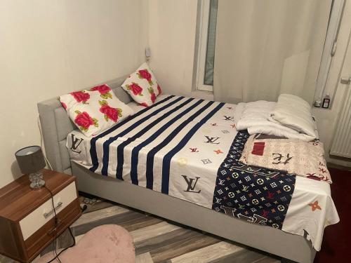 En eller flere senge i et værelse på Belle appartement sur liège