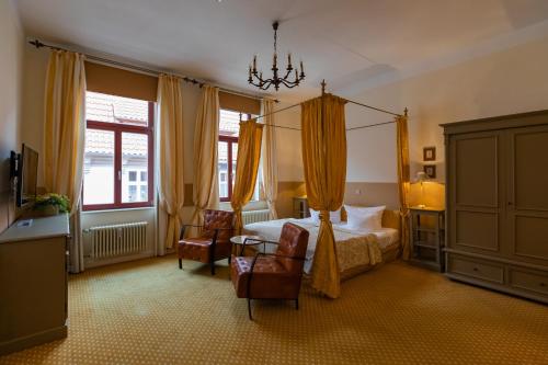 Postel nebo postele na pokoji v ubytování Hotel Zum Bär