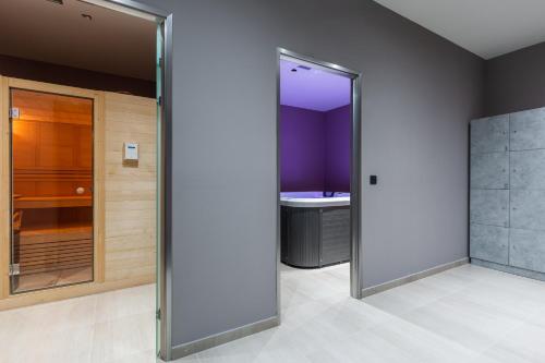 a bathroom with a shower and a sink at Zante Sun Resort in Lithakia