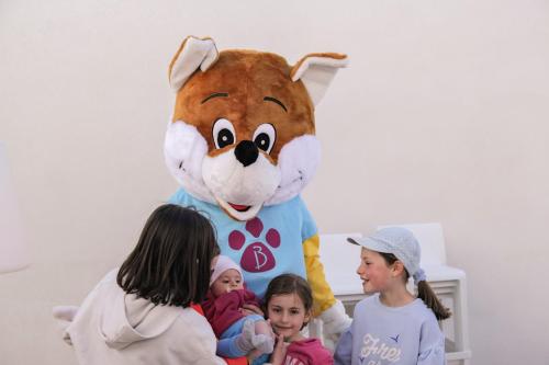 a group of children standing in front of a mascot at Belambra Clubs Port Camargue - Les Salins in Le Grau-du-Roi