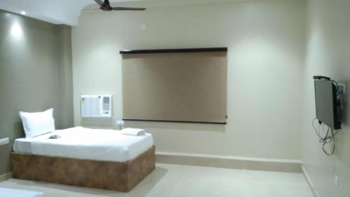 TV a/nebo společenská místnost v ubytování Hotel Sukhdham