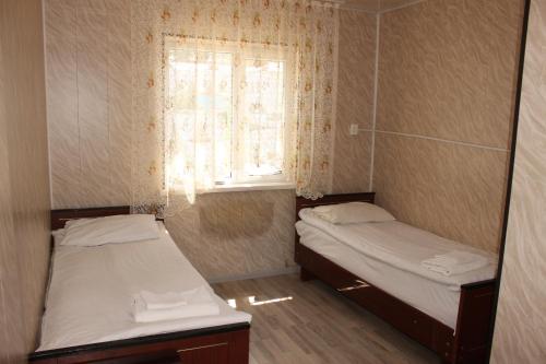 Cama o camas de una habitación en Guest House Jamal