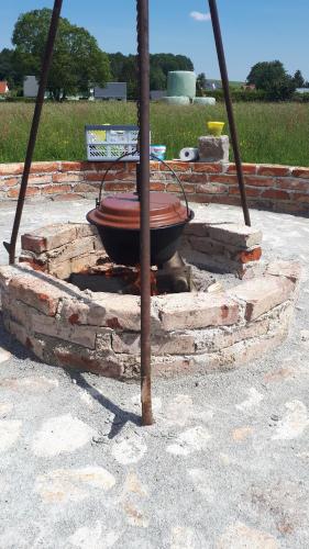 a boat sitting on a pile of bricks at Autark-Camp Gleis A. in Dürrhennersdorf