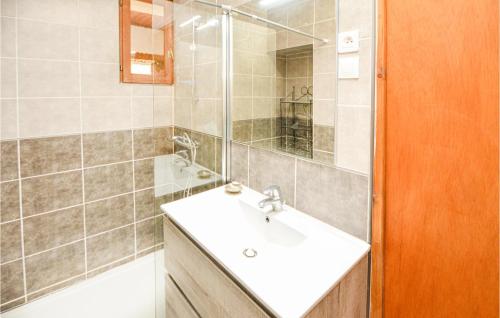 a bathroom with a sink and a shower at Awesome Home In Bessges With Wifi in Bessèges