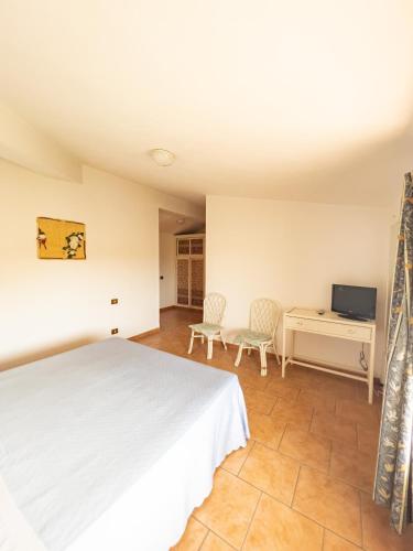 Postel nebo postele na pokoji v ubytování Albergo Ristorante Locanda Rosella