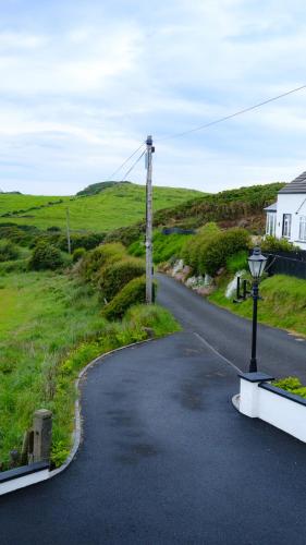 a winding road in the middle of a field at Horizon View Portstewart Tourist Board approved in Portstewart