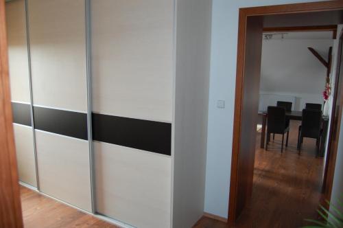 a room with a wall with black and white stripes at Penzion Alfa in Moravský Písek