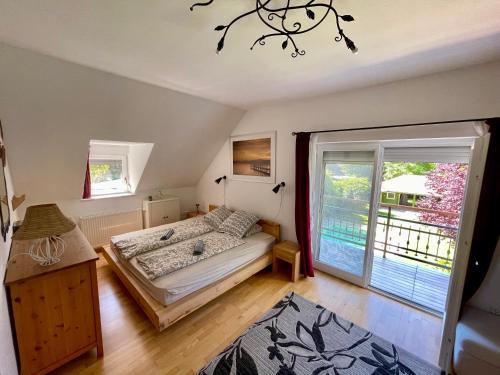 A bed or beds in a room at 5 bedroom villa very close to Balaton