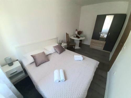 Postel nebo postele na pokoji v ubytování Apartman Jadranka