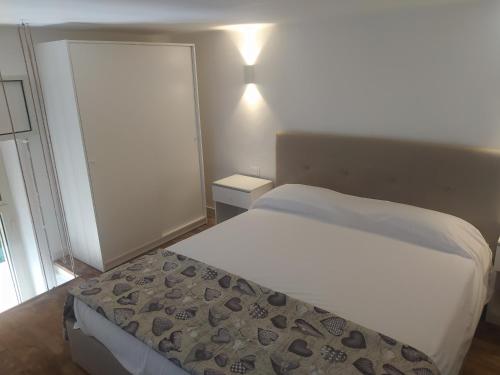 מיטה או מיטות בחדר ב-Salento vacanze