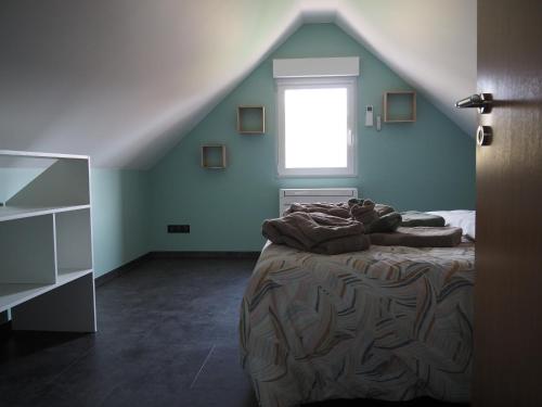 Postel nebo postele na pokoji v ubytování Gîte Le Renouveau avec jacuzzi privatif