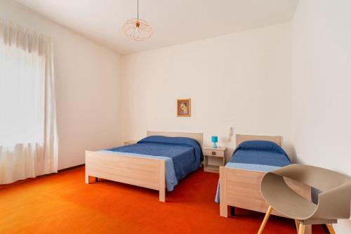 Postel nebo postele na pokoji v ubytování Casa Lilli 11 posti