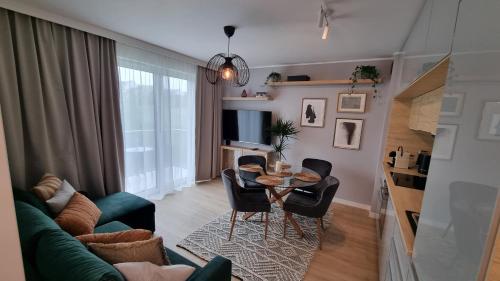 אזור ישיבה ב-Apartament Młody Gdańsk - bezpłatny parking, mocne WiFi, dobre połączenie z lotniskiem