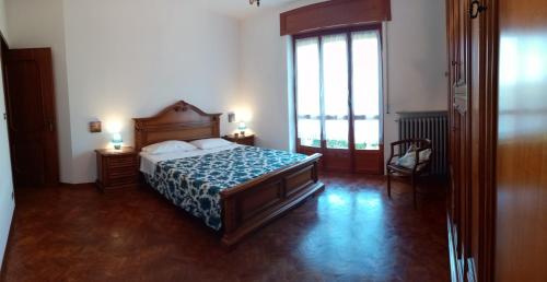 Ένα ή περισσότερα κρεβάτια σε δωμάτιο στο Casa Romme