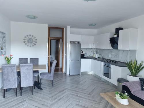 Kuchyň nebo kuchyňský kout v ubytování Apartments Ledic