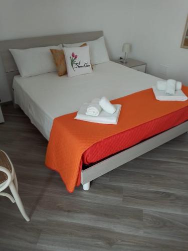 Postel nebo postele na pokoji v ubytování B&B Casa di Nonna Checca