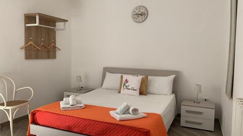 Postel nebo postele na pokoji v ubytování B&B Casa di Nonna Checca