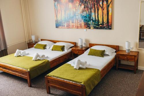 Llit o llits en una habitació de Laguna Green Guest House