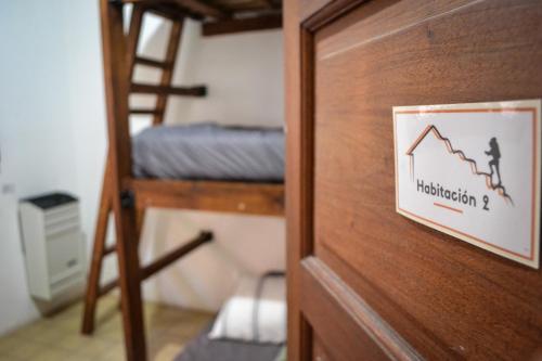 Una cama o camas cuchetas en una habitación  de Hostel Ruta76