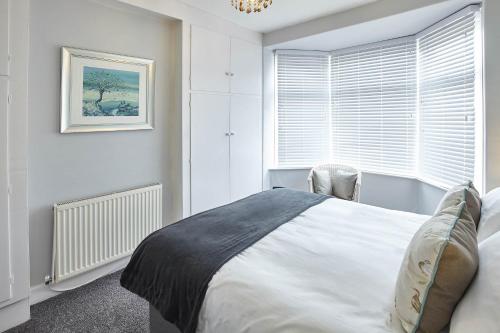 Ένα ή περισσότερα κρεβάτια σε δωμάτιο στο Host & Stay - Cobblestones