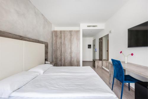 Cama o camas de una habitación en Hotel De Nac
