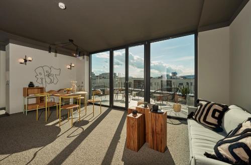 a living room with a couch and a table at SmartApart in Budapest