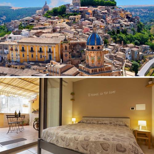 a bedroom with a view of a city at Pura Vida Barocca in Ragusa
