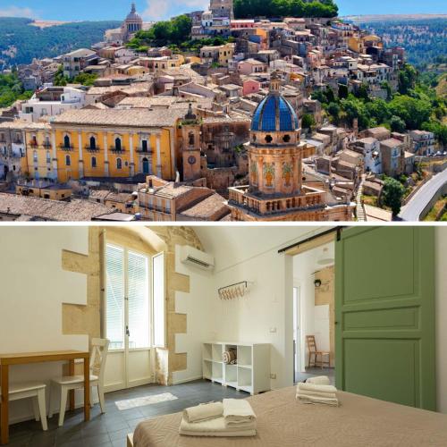 a room with a view of a city at Pura Vida Barocca in Ragusa