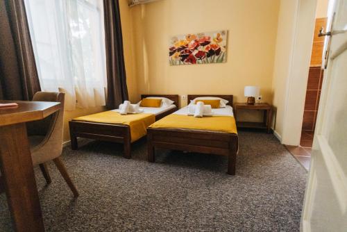 Ένα ή περισσότερα κρεβάτια σε δωμάτιο στο Laguna Green Guest House