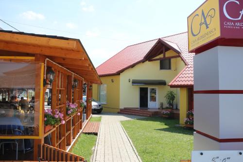 a building with a restaurant and a store at Casa Ardeleneasca in Timişoara