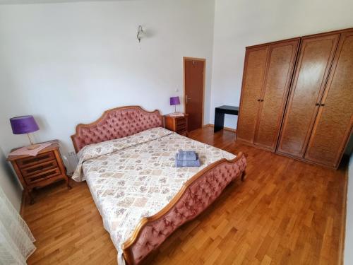 Postel nebo postele na pokoji v ubytování Sunny apartment with pool