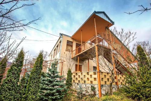 a house on a hill with trees at Dil Hill by Sam in Dilijan