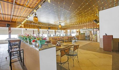 Treebo Premium Aristaにあるレストランまたは飲食店
