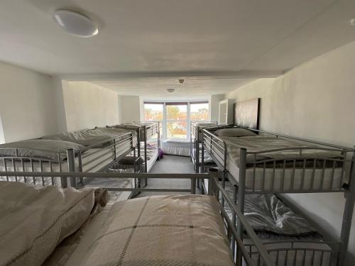 Ένα ή περισσότερα κρεβάτια σε δωμάτιο στο Blue Room Hostel Newquay