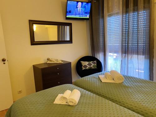 Postel nebo postele na pokoji v ubytování Charming Vilamoura Apartment with Shared Pool