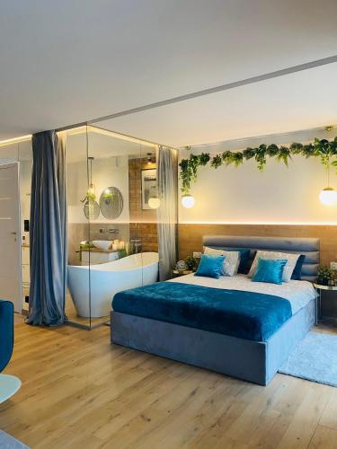 Ένα ή περισσότερα κρεβάτια σε δωμάτιο στο Apartament MoLoo III