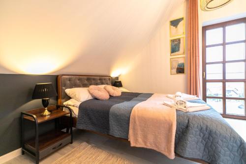 Posteľ alebo postele v izbe v ubytovaní Apartament Liściasty 2 z widokiem na góry - Dream Apart