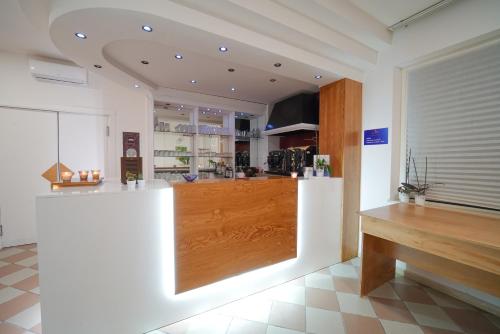 a large kitchen with a counter in a room at Hotel Rivabella in Davoli