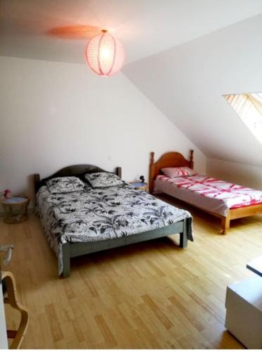 Кровать или кровати в номере La Miellerie du Massegros