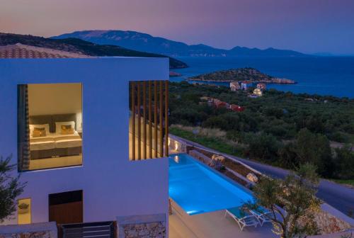 a view of a house with a swimming pool at The Sall Villa - Private pool and Breathtaking Views, by ZanteWize in Agios Nikolaos