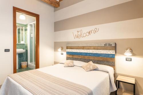 Postel nebo postele na pokoji v ubytování B&B Stella Lucca
