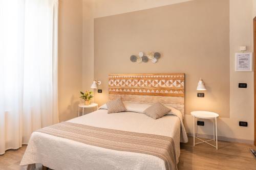 Postel nebo postele na pokoji v ubytování B&B Stella Lucca